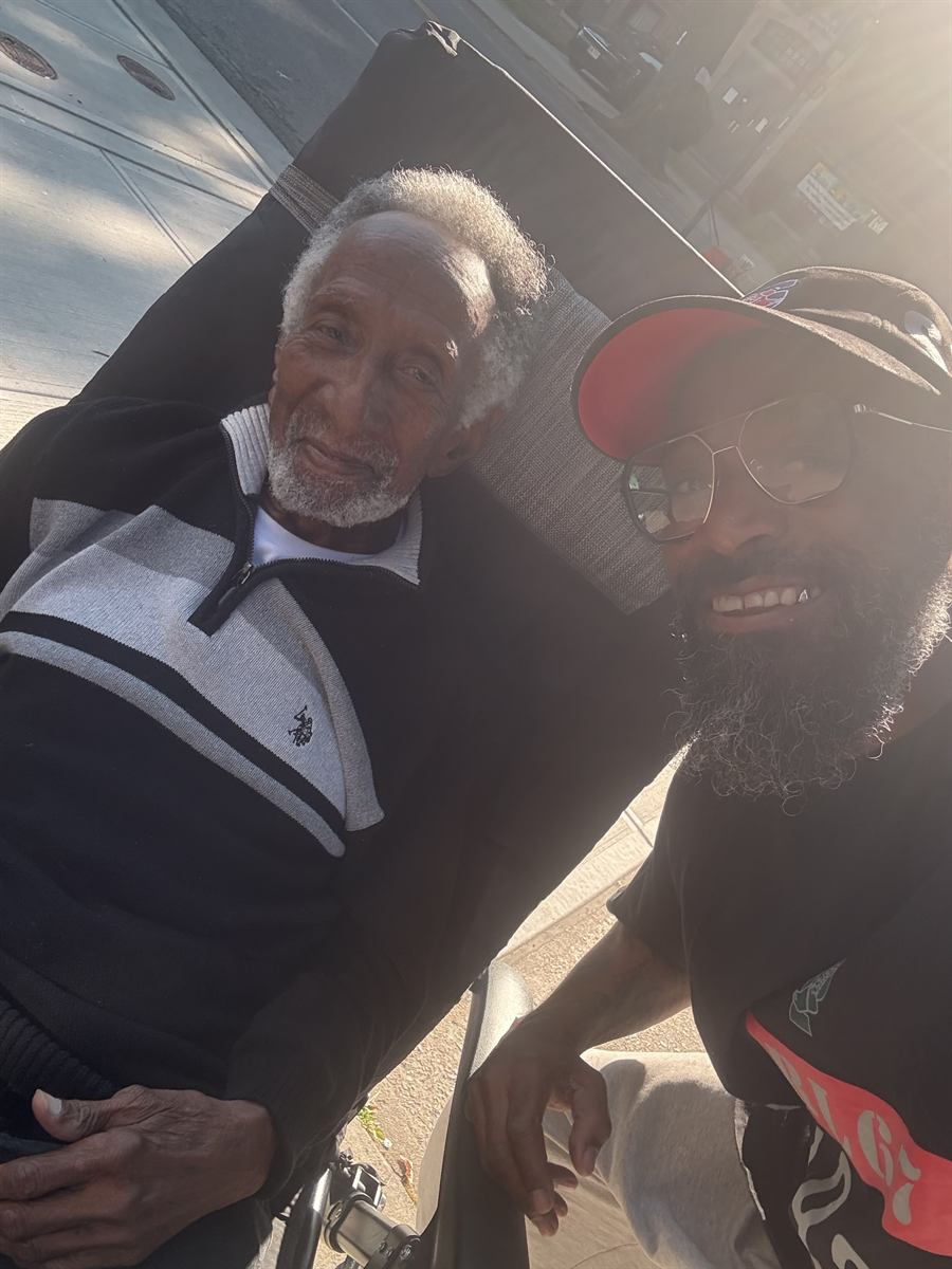 Prance with an older neighbour sitting out on the block